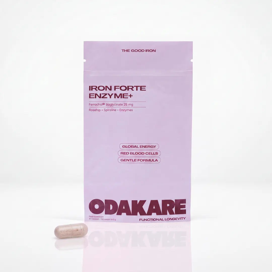Lilac resealable Odakare Iron Forte Enzyme+ pouch with a capsule in front of it, on a white background
